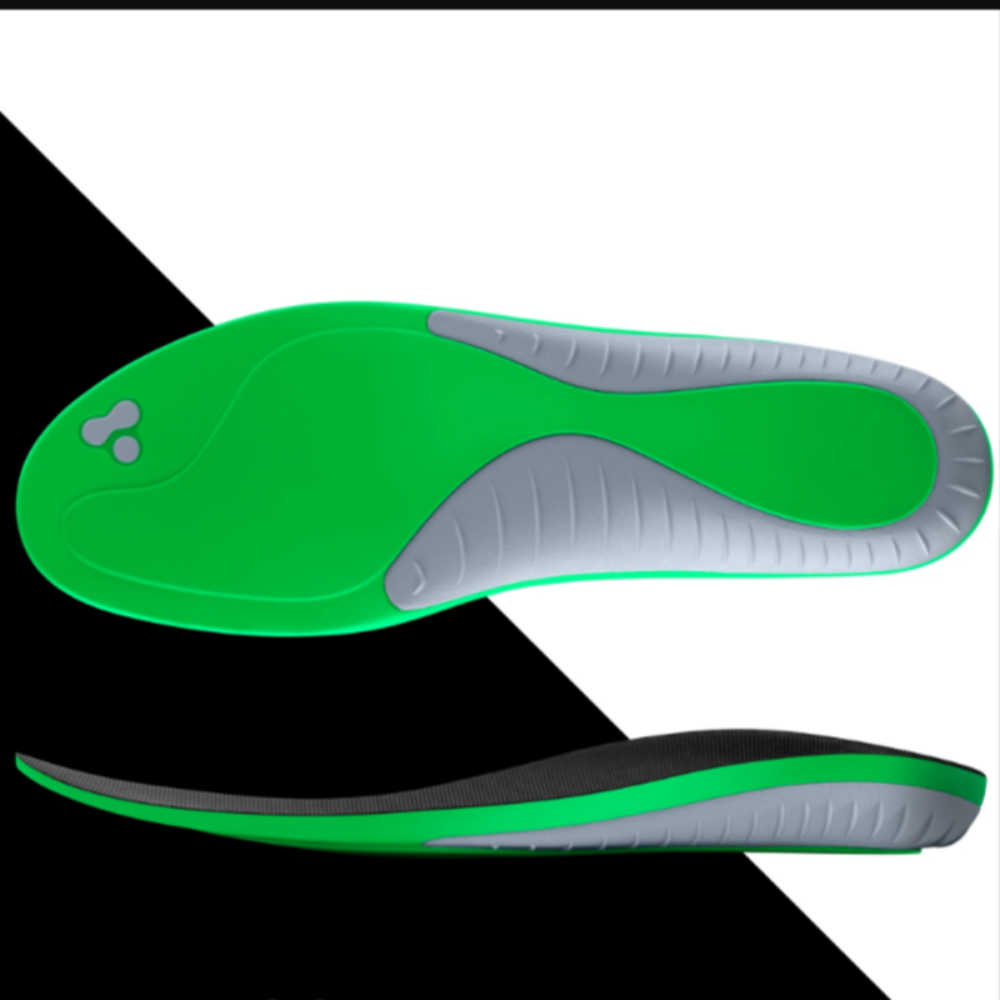 a pair of green insoles on a black and white background