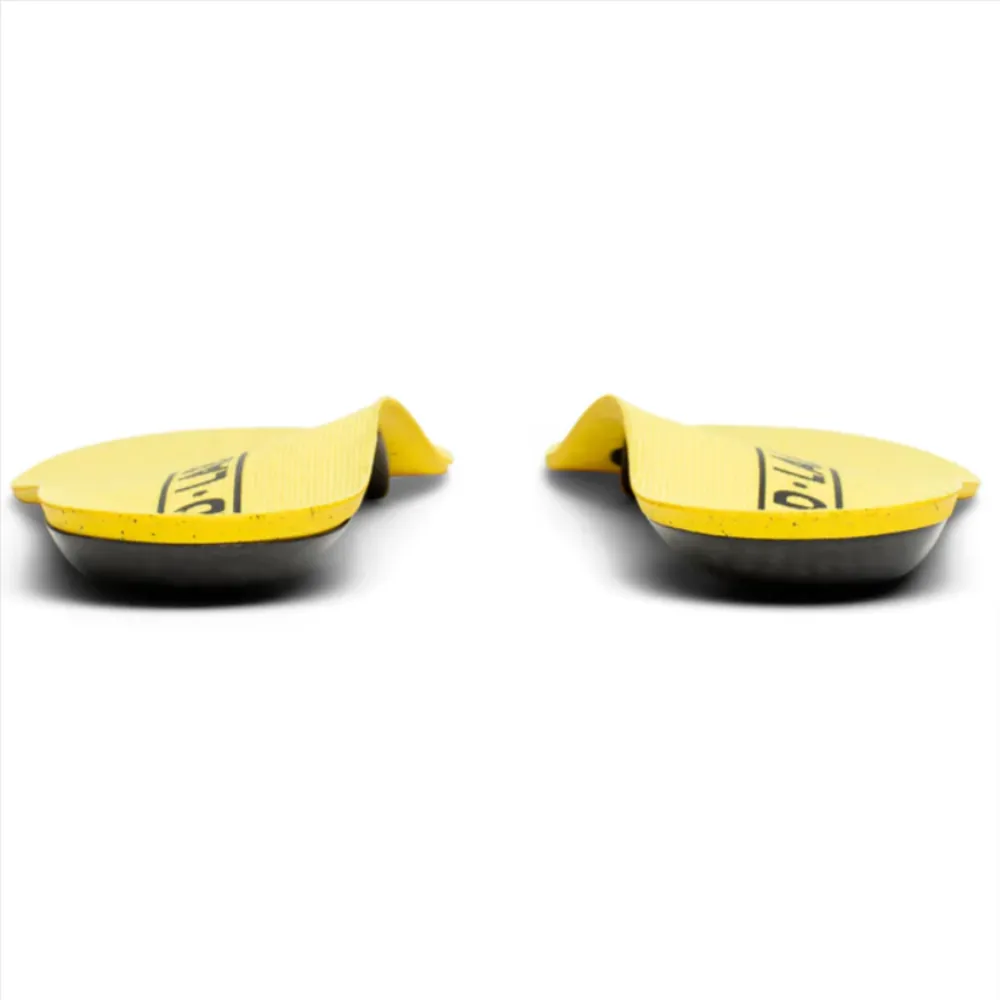 a pair of yellow shoe covers sitting on top of each other