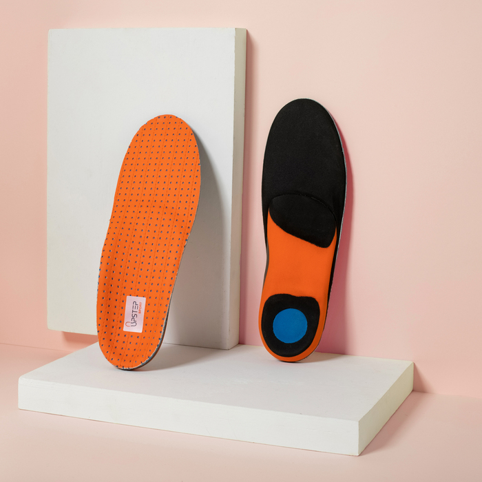 Black and Orange custom basketball orthotics displayed with right showing  bottom and left showing top of insole 
