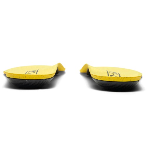 A pair of yellow insoles that can be worn inside loafers