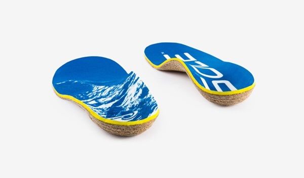 Blue and white insoles by SOLE on display 